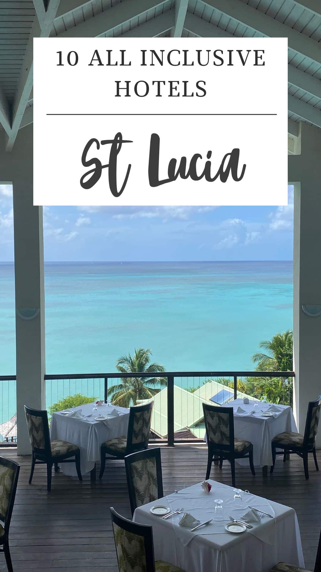 Outdoor dining area with tables and chairs overlooking the ocean, featuring a sign that reads "10 All Inclusive Hotels St Lucia," highlighting some of the best all inclusive resorts in St. Lucia.
