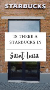 The sign on the brick wall beneath the Starbucks logo intriguingly asks, "Is there a Starbucks in Saint Lucia?.