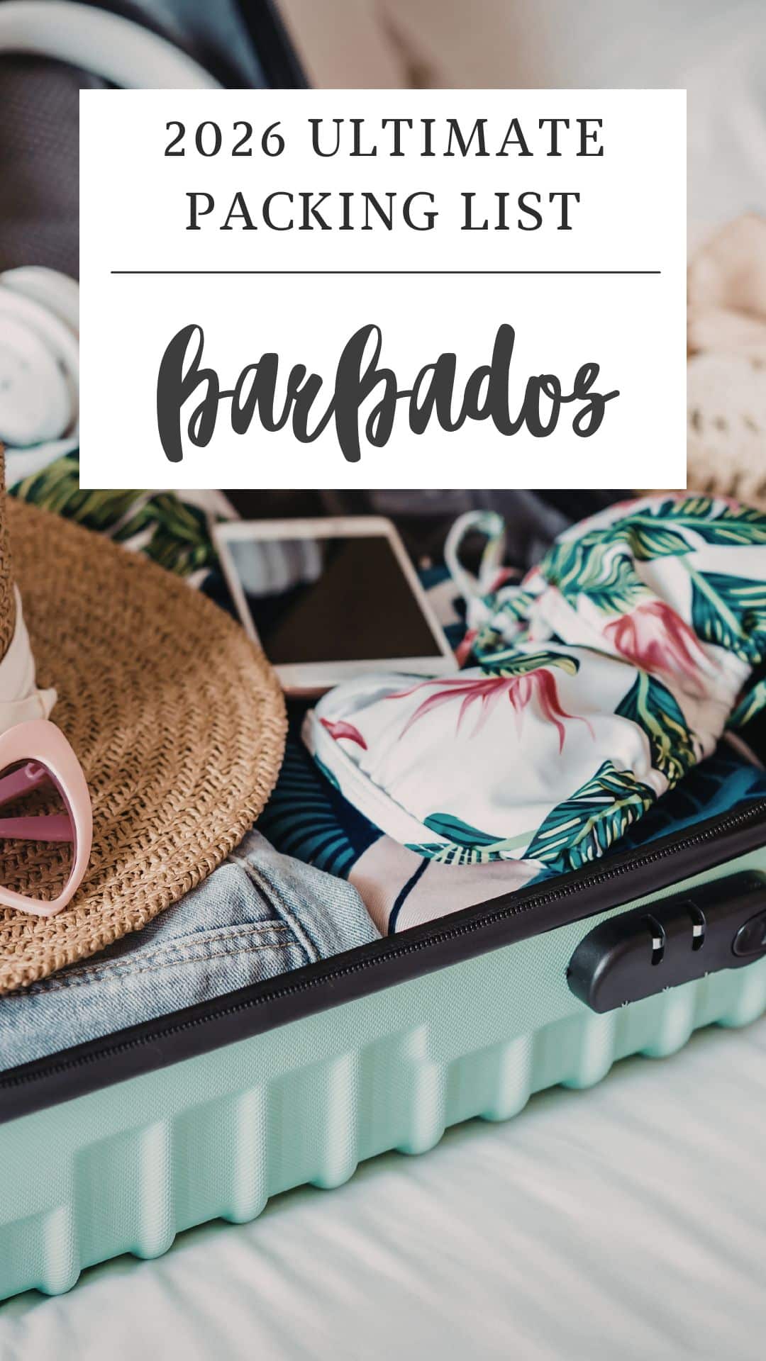 Open suitcase with clothes, sunhat, sunglasses, phone, and a floral bikini, overlaid with text: "2026 Ultimate Barbados Packing List.